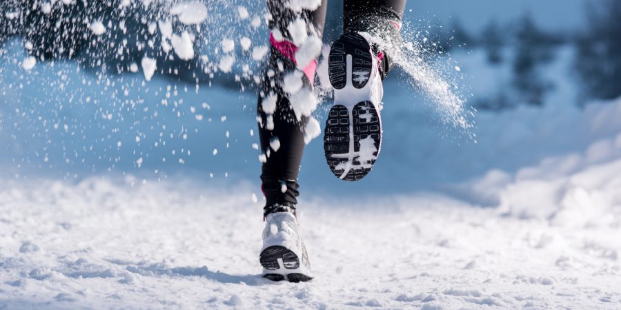 Close up of someone running in the snow - 5 things to consider in the first 10 day of your fitness membership