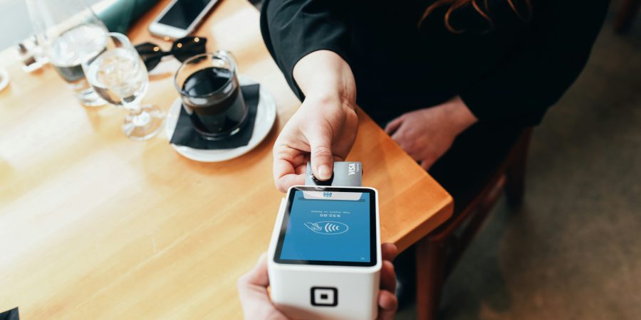 Can my prepaid credit card expire? - image of a woman paying for something