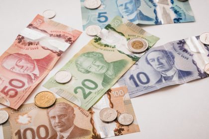 Money on table representing payday loans and high-cost credit