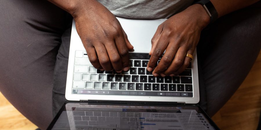 Man's hands on a laptop