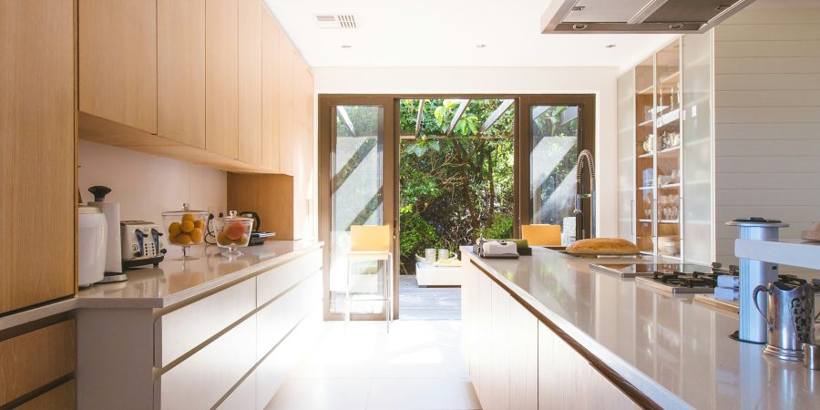 Image of a clean minimalist kitchen - 10 tips to declutter and live with less
